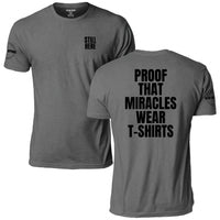 Still Here: Proof That Miracles Wear T-Shirts Tee, heather gray, front and back